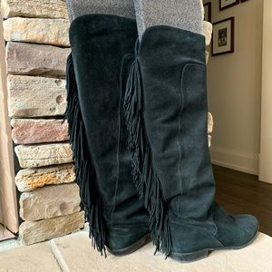 Knee high suede fringed pull- on flat heeled boot